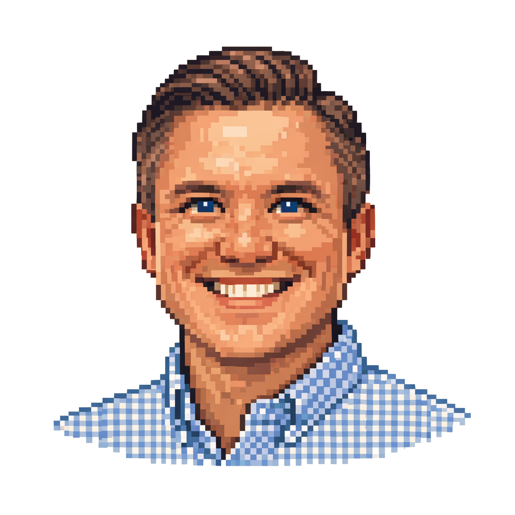 Pixel portrait of Neil Hiddink smiling in a blue checkered shirt.